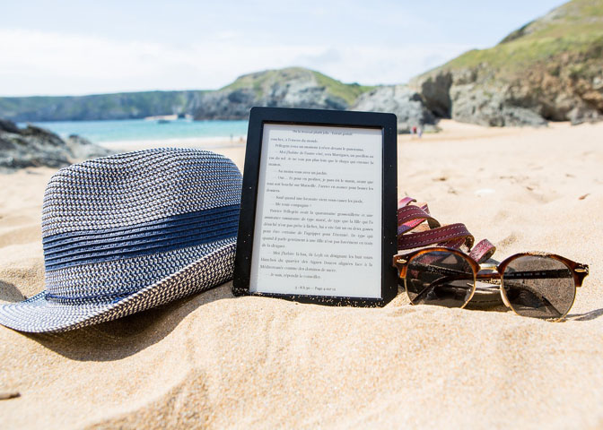 ebook on a sandy beach